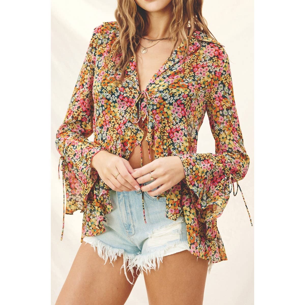 Flower Bed Ruffled Tie Front Blouse