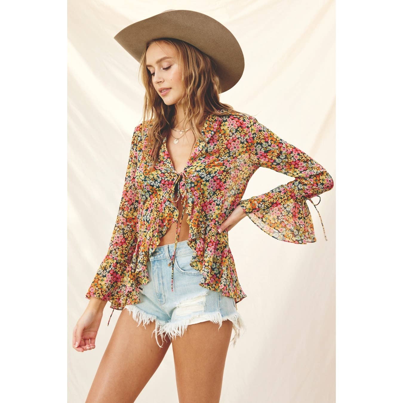 Flower Bed Ruffled Tie Front Blouse