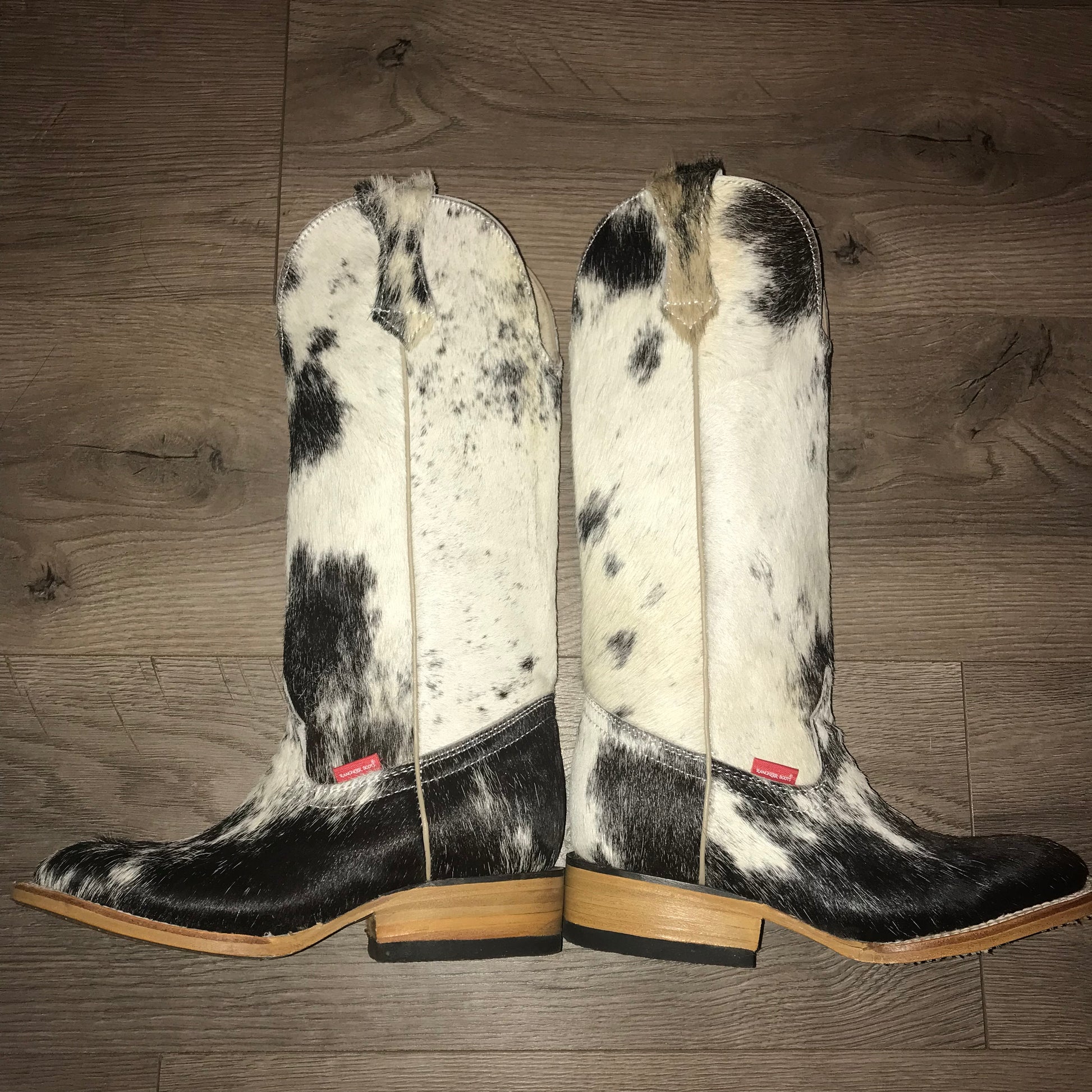 Cowhide cowgirl boots best sale