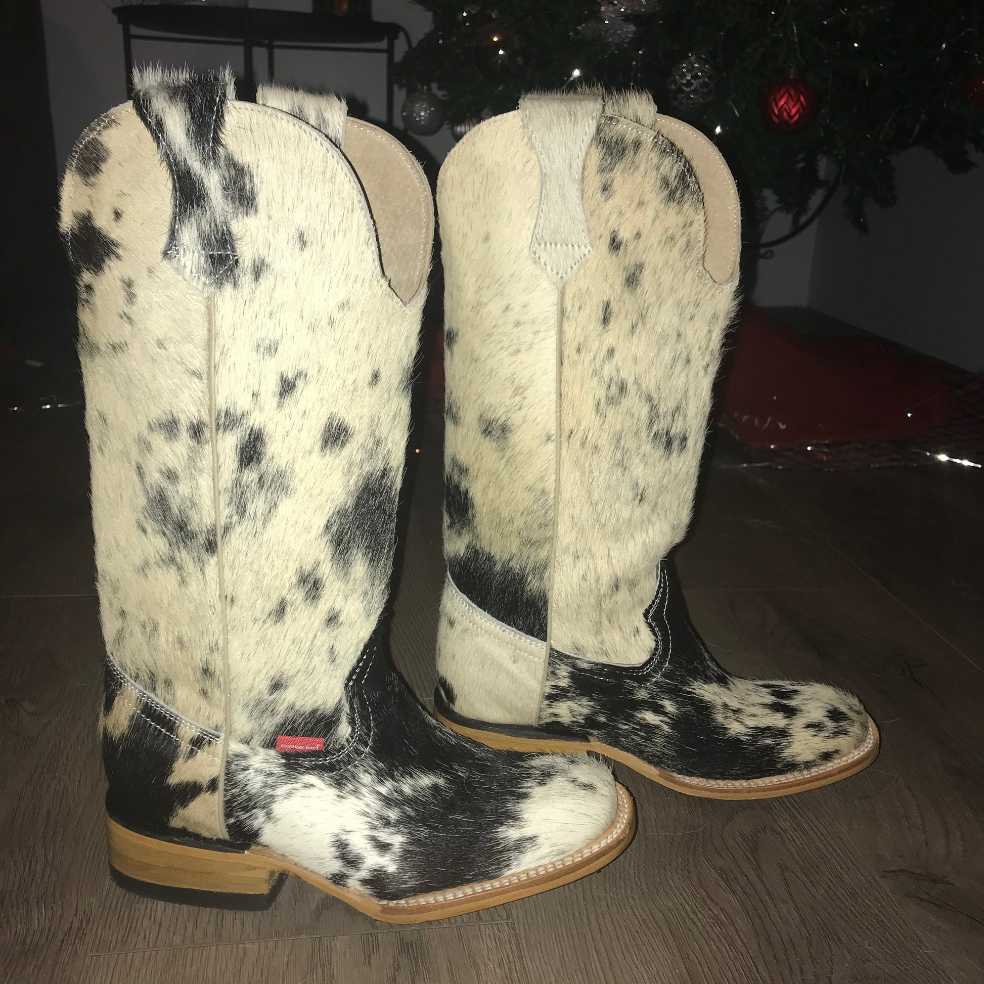 Cow print cowboy sales boots